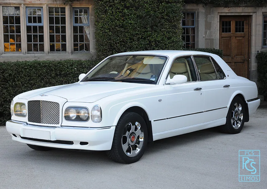 Pearl white Bentley wedding car
