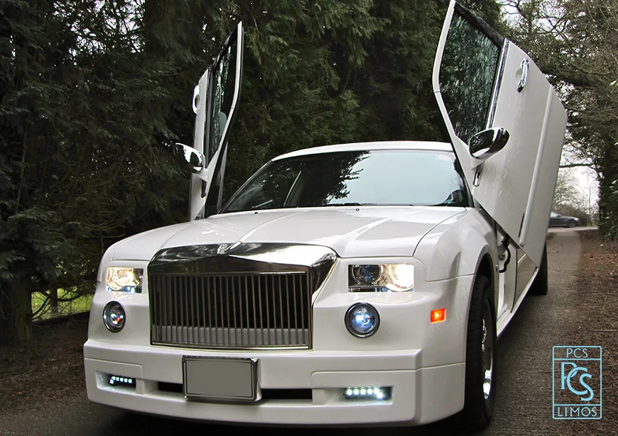 White limousine for wedding party transport