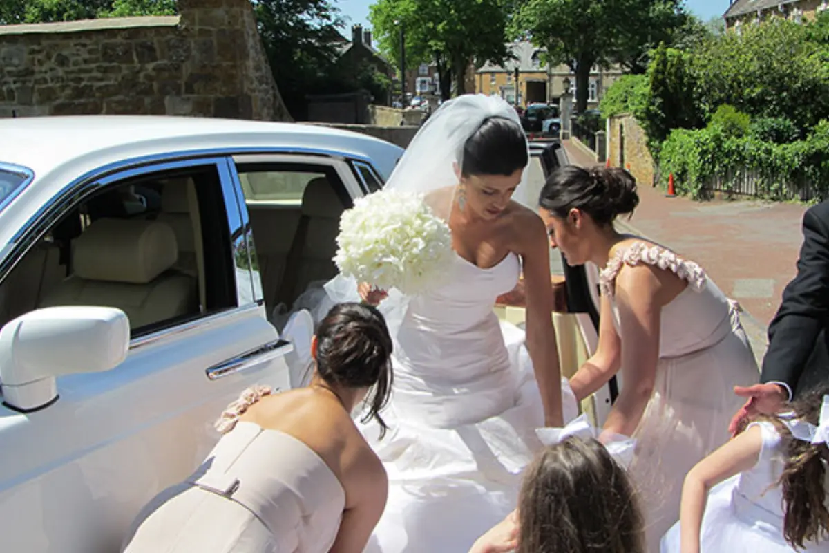 Bride arriving in a wedding car
